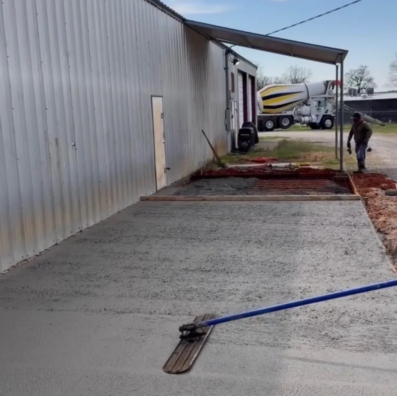 Apron pour beside a metal building