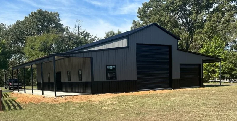 Gray barn with lean-tos
